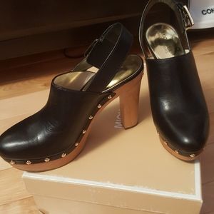 Michael Kors woman high heels.